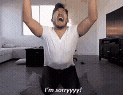 Man Kneeling With Arms Up Saying I'm Sorry GIF