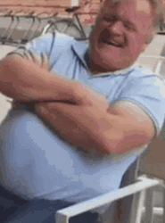 Man Laughing Cross Arms GIF