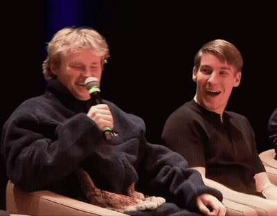 Man Laughing Holding Microphone GIF