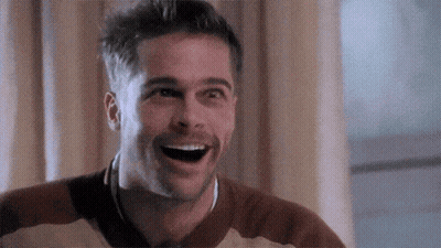 Man Laughing In Brown And White Sweater GIF