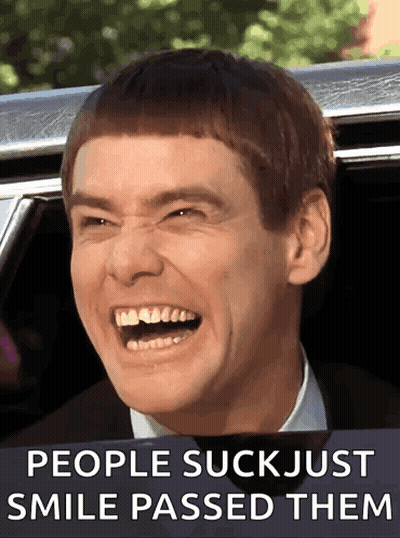 Man Laughing In Car People Suck Just Smile Passed Them GIF