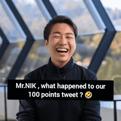 Man Laughing In Front Of Mr. Nik What Happened To Our 100 Points Tweet Sign GIF
