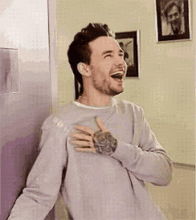 Man Laughing Next To Refrigerator GIF