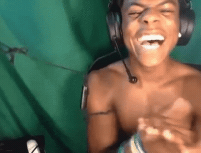 Man Laughing Shirtless With Headphones GIF