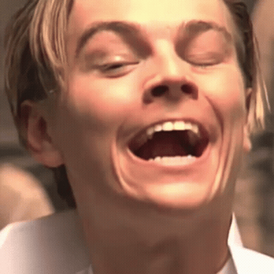 Man Laughing With Eyes Closed GIF