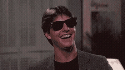 Man Laughing With Mouth Open And Sunglasses GIF