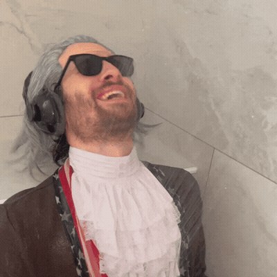 Man Laughing With Sunglasses And Headphones GIF