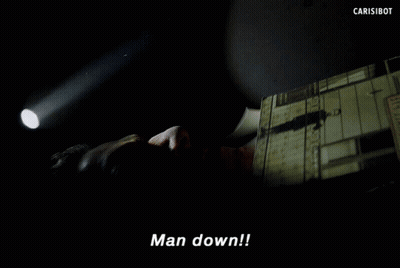 Man Laying Down Hand Pointing Says Man Down GIF