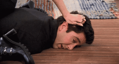 Man Laying Head On Woman's Lap GIF