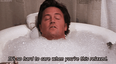 Man Laying In Bathtub Saying Its So Hard To Care GIF