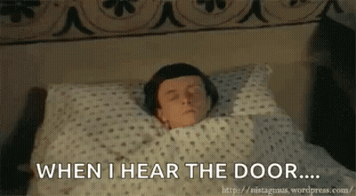 Man Laying In Bed Eyes Closed Saying When I Hear The Door GIF