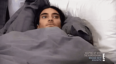 Man Laying In Bed With Blanket On Head GIF