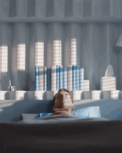 Man Laying In Bed With Eyes Closed GIF