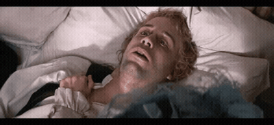 Man Laying In Bed With Mouth Open GIF