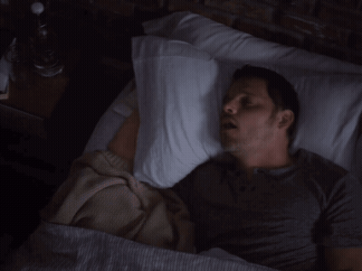 Man Laying In Bed With Pillow On Head GIF