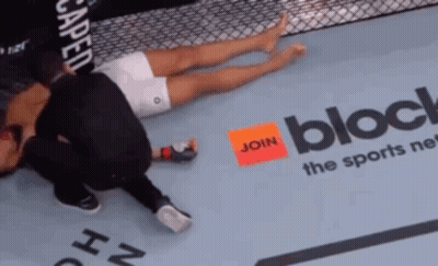 Man Laying In Boxing Ring With Join The Sports Network Sign GIF