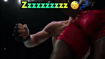 Man Laying In Boxing Ring With Zzzzzzzzz Above GIF