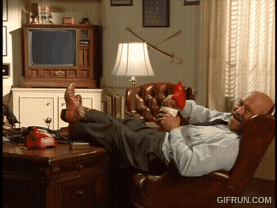 Man Laying in Chair Feet Up With Run.com Logo