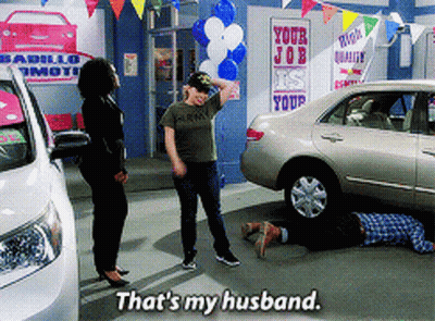 Man Laying In Front Of Car Saying That's My Husband GIF