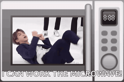 Man Laying In Front Of Microwave Saying I Can Work The Microwave GIF