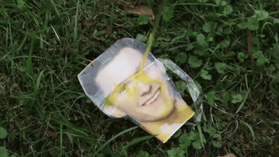 Man Laying In Grass GIF