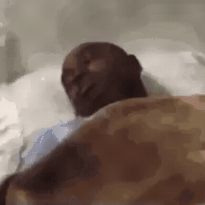 Man Laying In Hospital Bed Smiling GIF