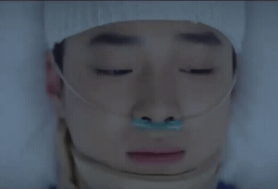 Man Laying In Hospital Bed With Leg Bandage GIF
