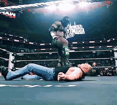 Man Laying In Wrestling Ring Raw Sign GIF