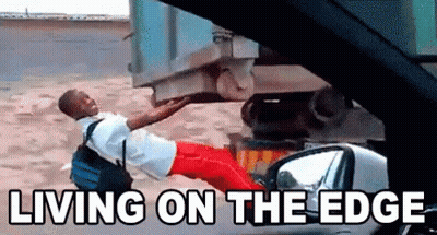 Man Laying Next To Car Living On The Edge GIF