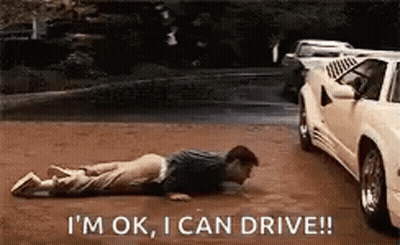Man Laying Next To Car Says I'm Ok I Can Drive GIF