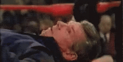 Man Laying On Back In Boxing Ring Eyes Closed GIF