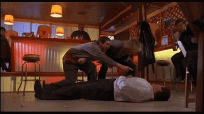Man Laying On Bar Floor Pointed At GIF