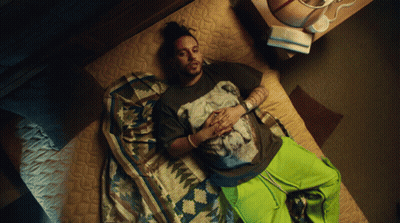 Man Laying On Bed In Horse T-Shirt GIF