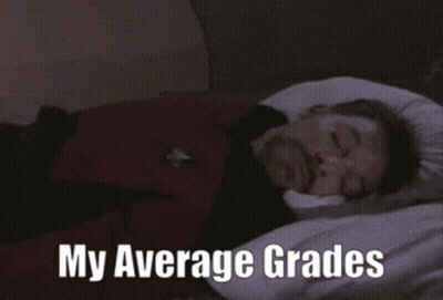Man Laying On Bed Saying Checks Canvas My Average Grades GIF