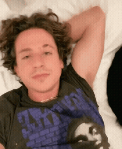 Man Laying On Bed Wearing Apocalypse T-Shirt GIF