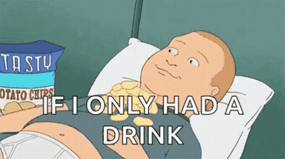 Man Laying On Bed With Bag Of Potato Chips GIF