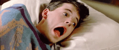 Man Laying On Bed With Blanket On Head GIF