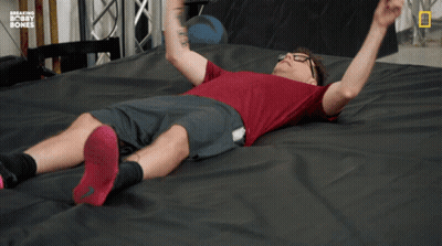 Man Laying On Bed With Breaking Bobby Bones GIF