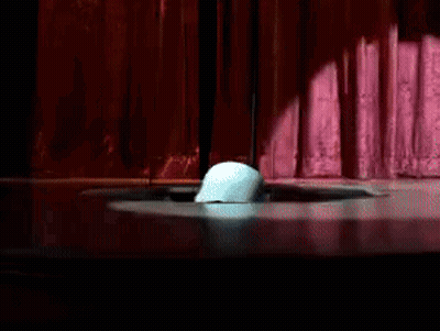Man Laying On Bed With Puppet On Back GIF