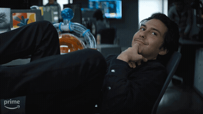 Man Laying On Chair With Feet Up And Prime Logo GIF