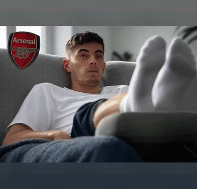 Man Laying On Couch Feet Up Arsenal GIF