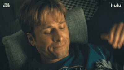 Man Laying On Couch With Hands Behind Head Chad Powers GIF