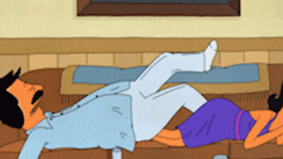Man Laying On Floor Beside Woman In Purple Dress GIF