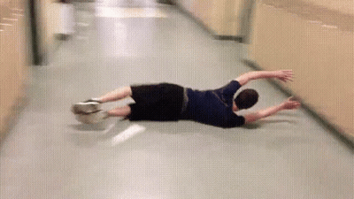 Man Laying On Floor In Hallway GIF