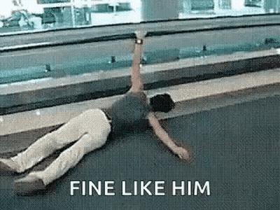 Man Laying On Floor With Arms Outstretched Saying Fine Like Him GIF