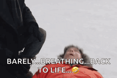 Man Laying On Ground Barely Breathing Back To Life GIF