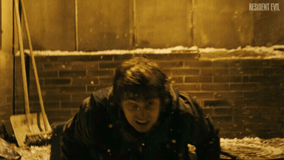 Man Laying On Ground Resident Evil GIF