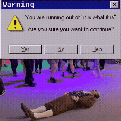 Man Laying On Ground Under Warning Screen GIF