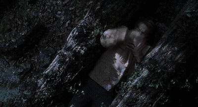 Man Laying On Ground With Hands Over Face GIF