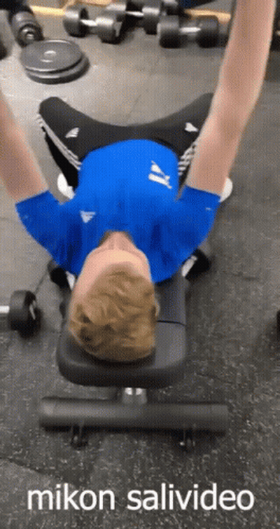 Man Laying On Gym Bench Arms Outstretched GIF